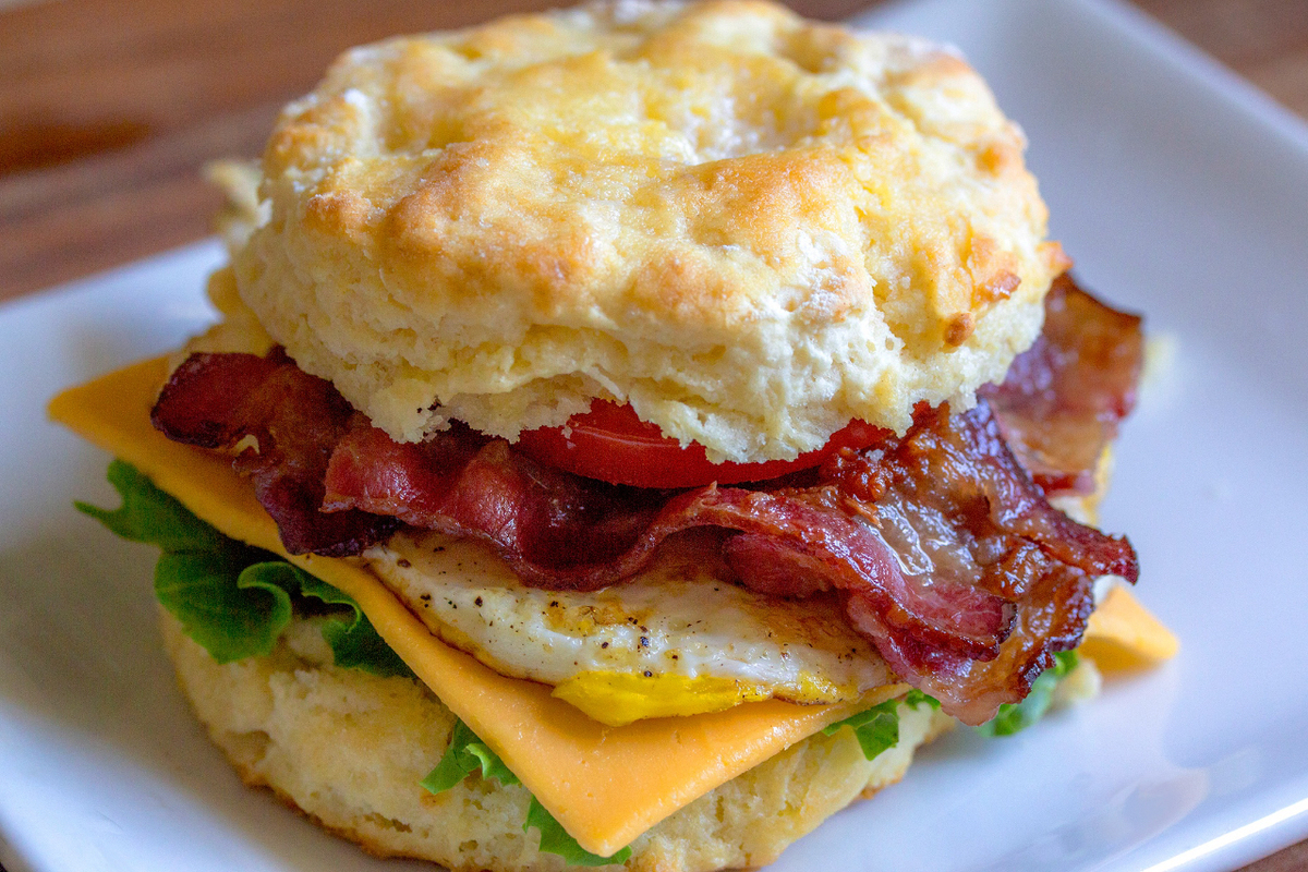 Delicious biscuit with egg and bacon